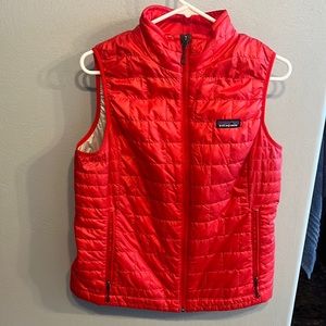 Women’s medium red Patagonia down vest.